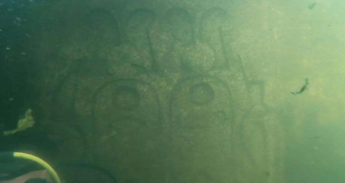 Underwater Rock Carvings Featured